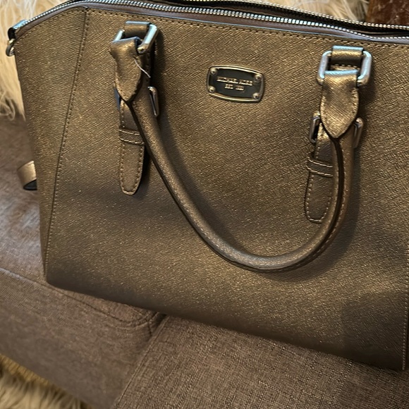 Michael Kors silver purse also worn as crossbody. - Picture 1 of 4